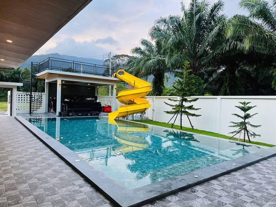 Site photograph of Khanom Pool Villa: Pool and slide