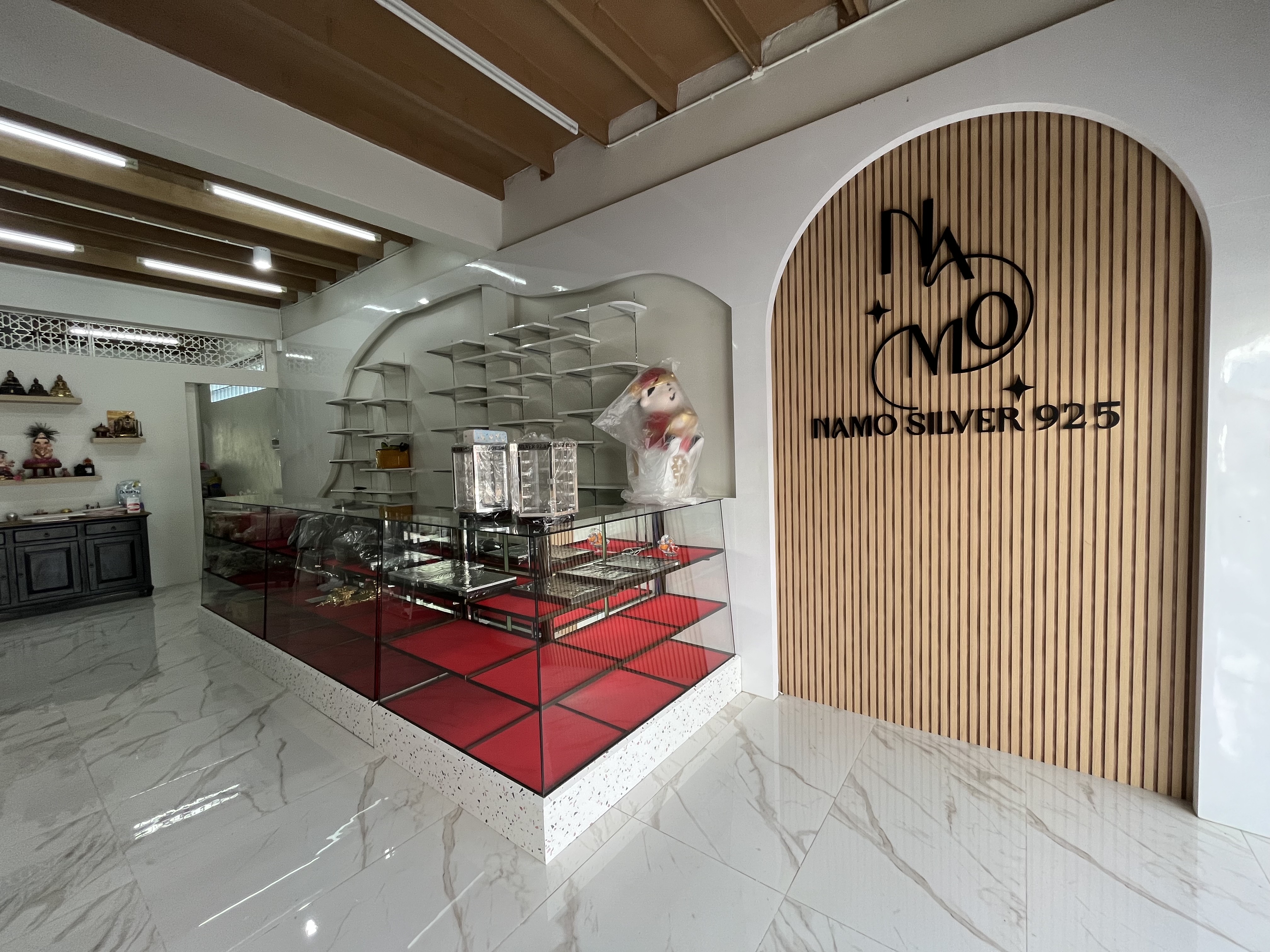 Site photograph of Namo Silver: Namo Silver signage and display wall