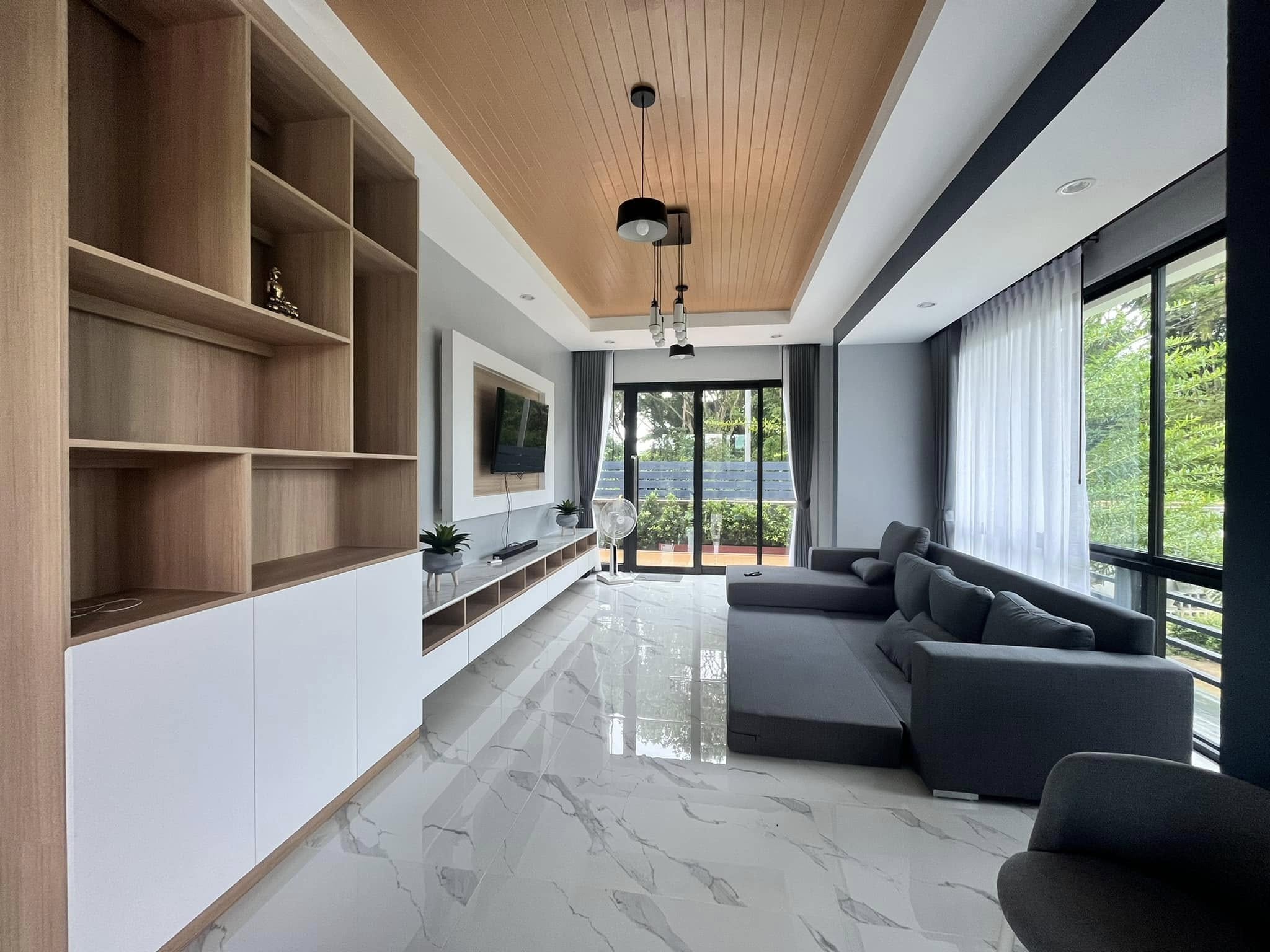 Built photograph — living room of the single-storey house