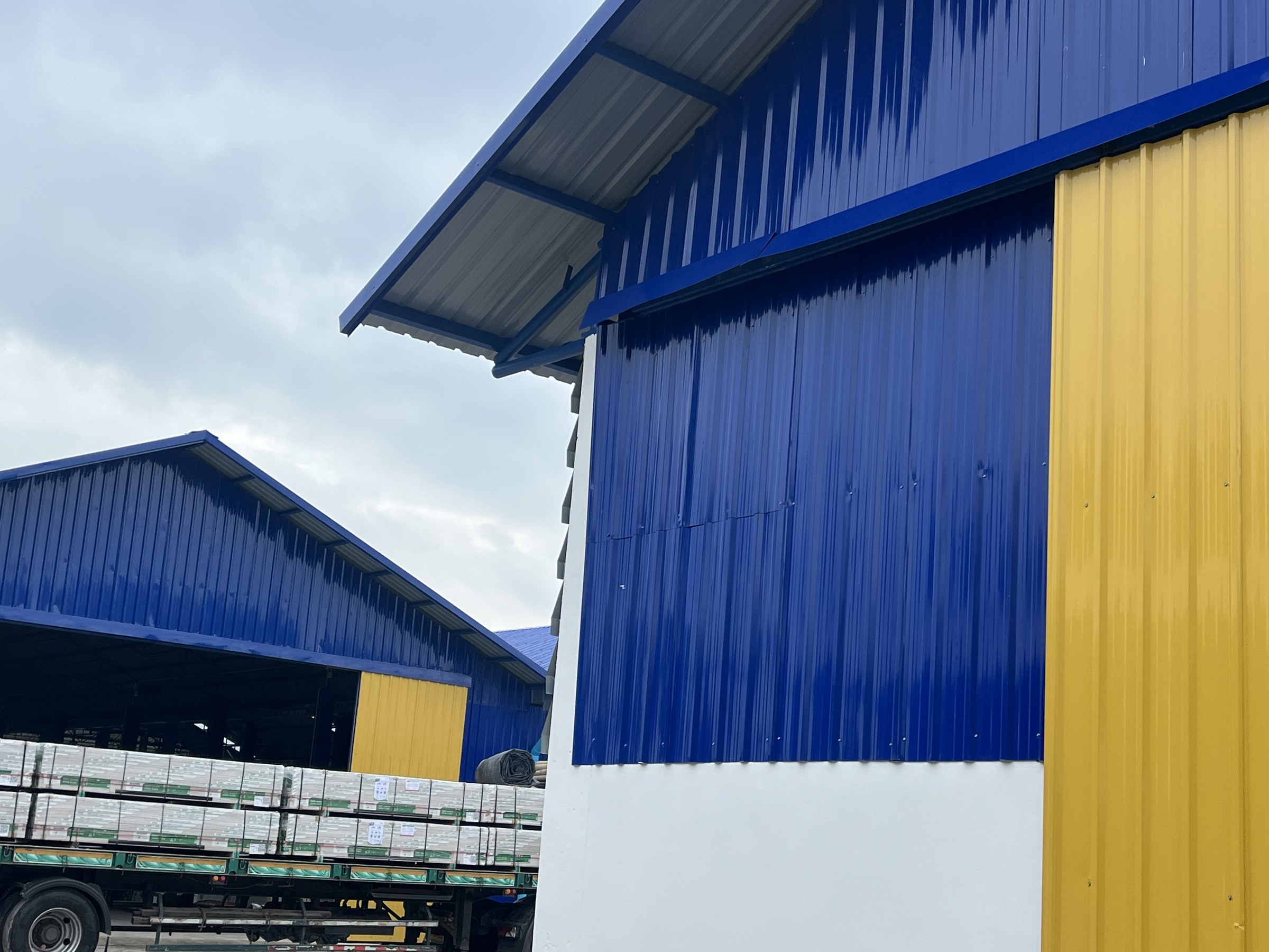 Factory Renovation - Tha Phae - Cladding and loading area detail