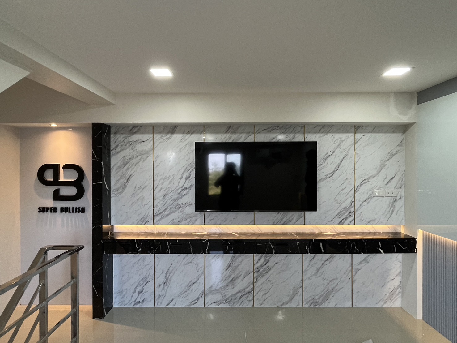 Site photograph of Trader Office: Built display wall